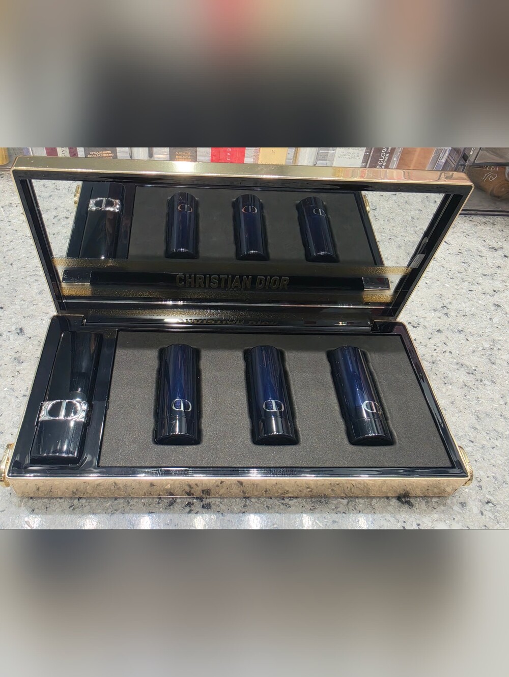 The "Dior Lipstick Clutch" (Minaudière) featuring shades 965, 913, 674, and 471 - Picture 3 of 5